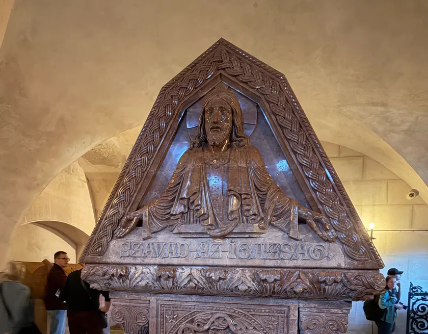 Carved wooden triptych depicting scenes of Jesus